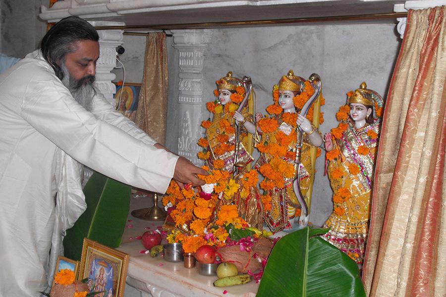 Brahmachari Girish Ji is offering garland to Shri Hanuman Ji after pujan at Ram Darbar Temple, Bhopal in May 2013. 